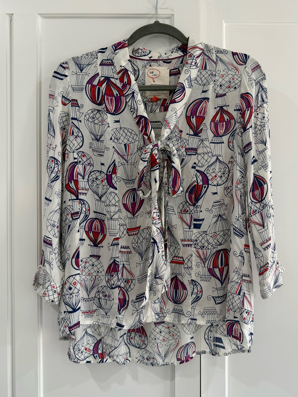 Conversations by Anthropologie 18 of 52 Hot Air Balloon Print Tie-Neck Blouse